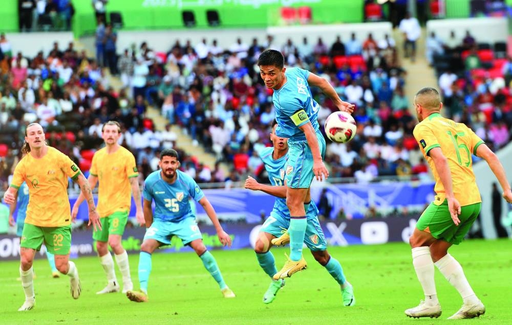 Sunil Chhetri jumps to head the ball during the AFC Asian Cup Group B match against Australia on Saturday. PICTURES: Shaji Kayamkulam