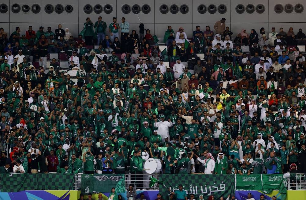 Saudi Arabia fans in the stands. REUTERS