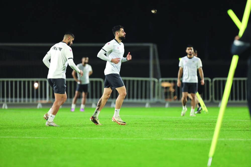 Palestine players train in Doha on Wednesday, on the eve of their Asian Cup Group C match against United Arab Emirates.