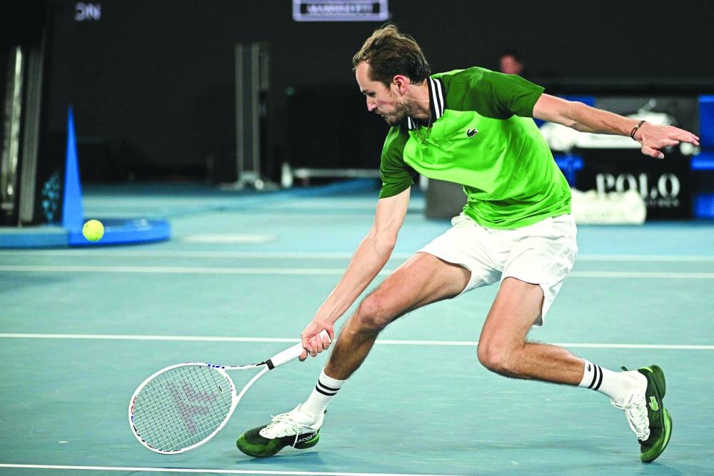 Russia’s Daniil Medvedev hits a return against Finland’s Emil Ruusuvuori during their singles match on day five of the Australian Open on Thursday. (AFP)