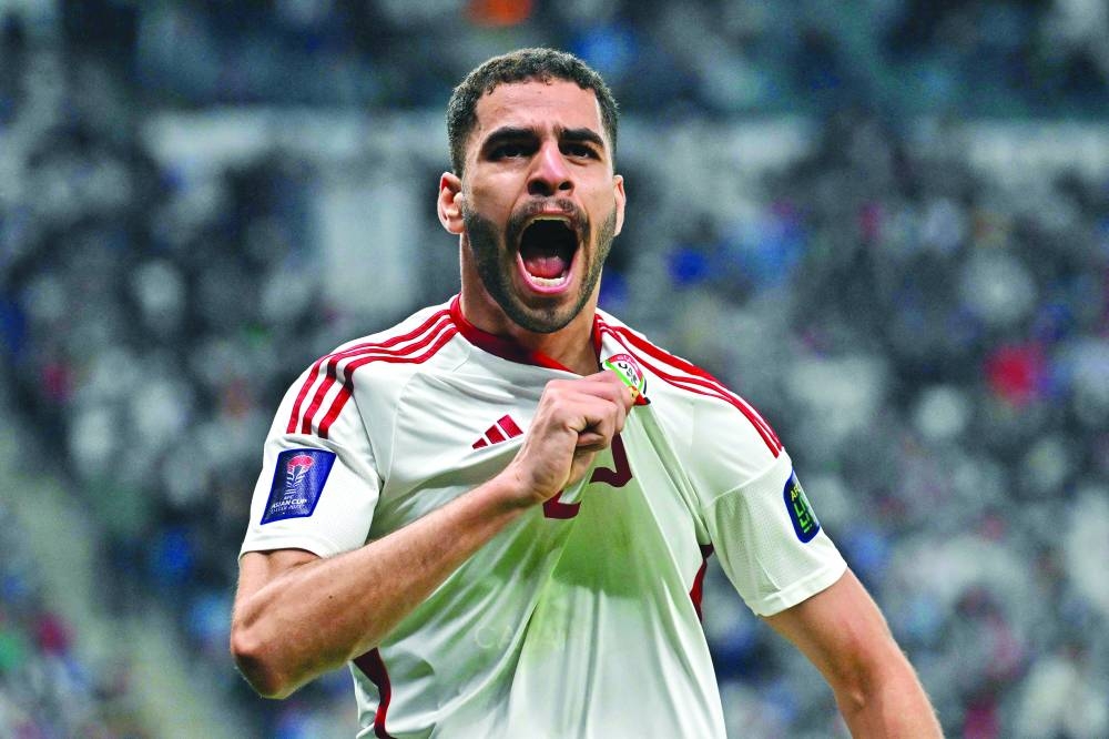 UAE’s forward Sultan Adil reacts after scoring his team’s first goal against Palestine on Thursday. (AFP)