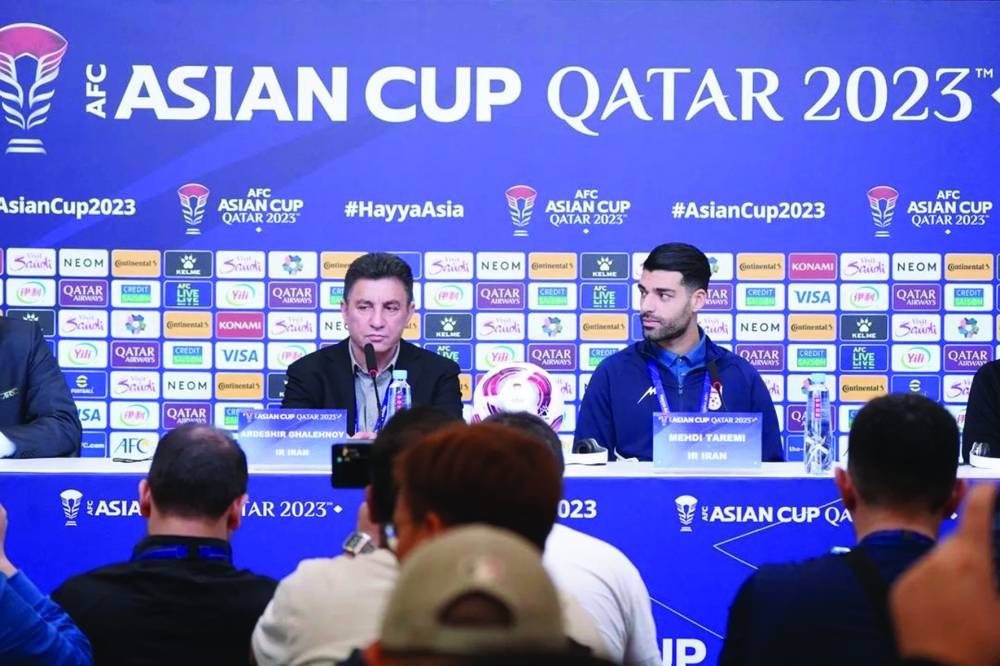 Iran coach Amir Ghalenoei (left) and forward Mehdi Taremi address a press conference on Thursday, ahead of their match against Hong Kong.