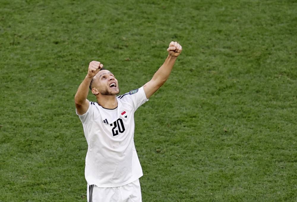 Iraq's Osama Rashid celebrates after the match. REUTERS