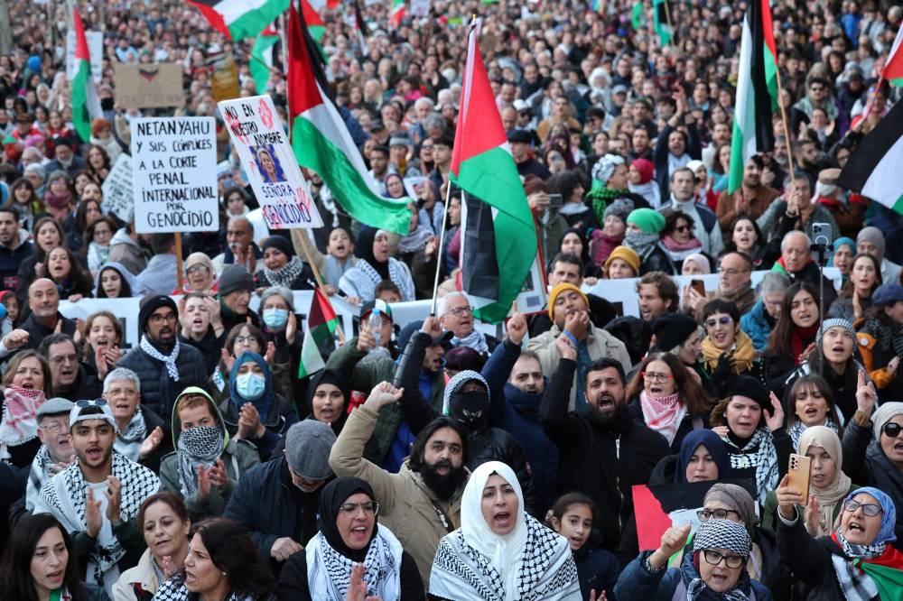 Protesters attend a rally in support of the people from Gaza, in the Palestinian territories, in Barcelona on Saturday. AFP