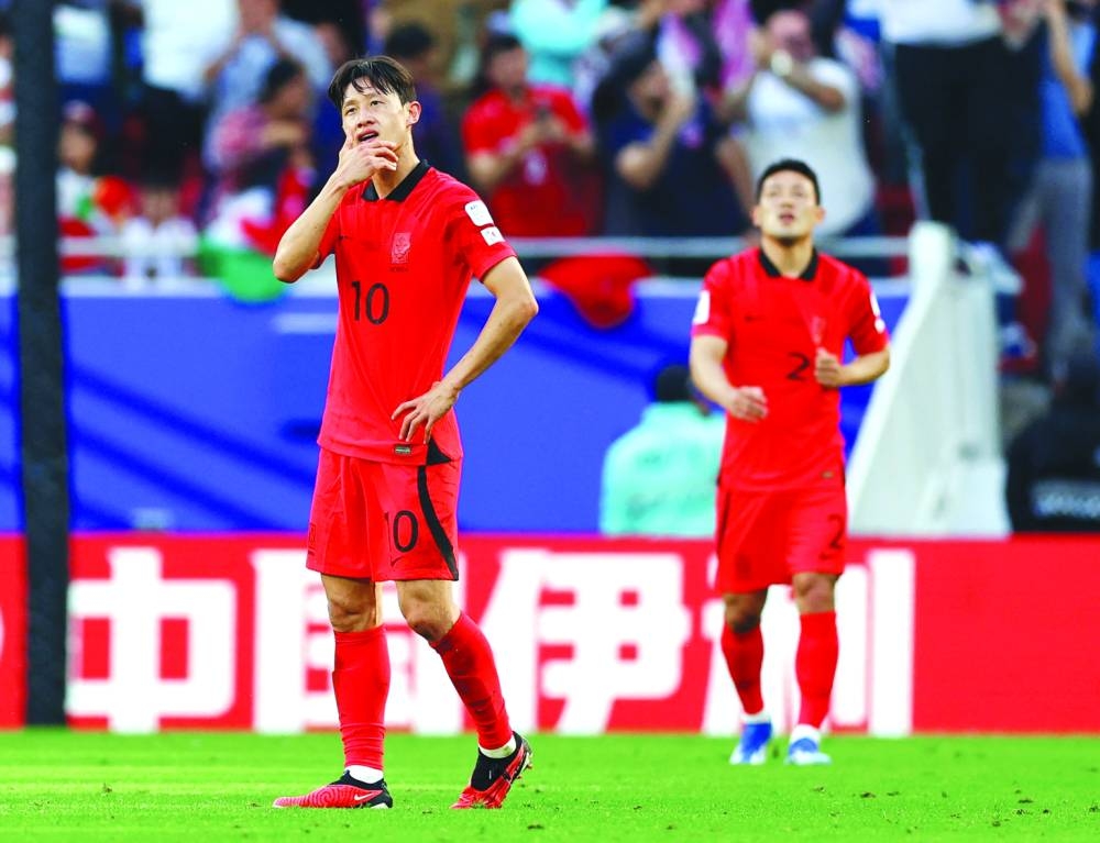 South Korea’s Lee Jae-Sung looks dejected after Jordan’s Yazan al-Naimat scored a goal. (Reuters)