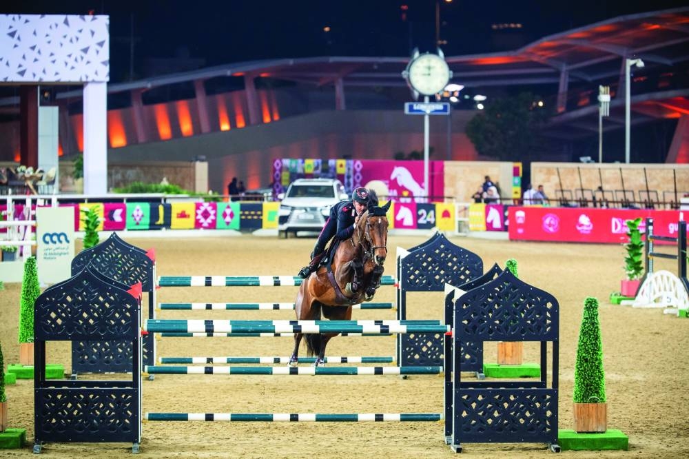 Emanuele Gaudiano clears a bar with Nikolaj de Music during the third and final leg of the Doha Tour International Championship at Al Shaqab on Thursday.
