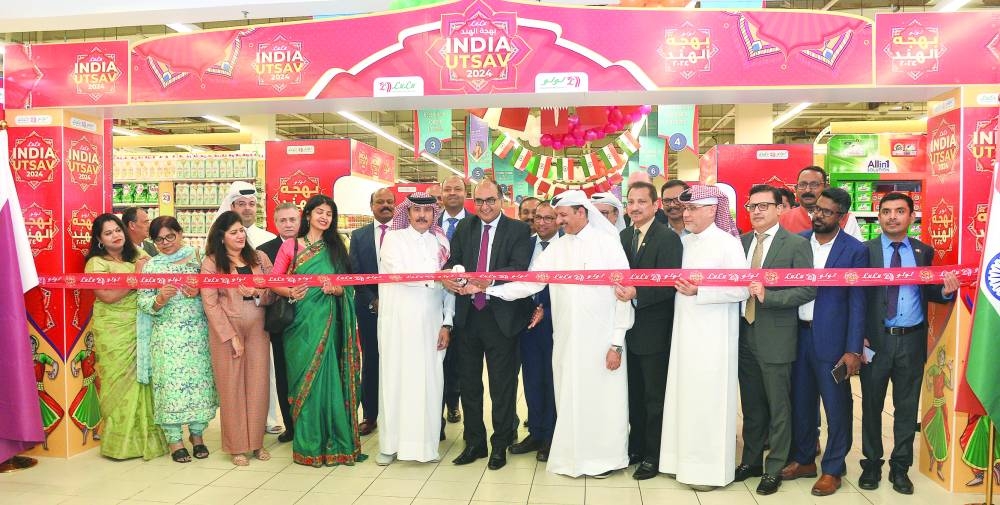 Indian ambassador Vipul leading the ribbon-cutting ceremony during the inauguration of India Utsav 2024 in the presence of Qatari dignitaries and community leaders, including representatives from various Indian organisations. PICTURE: Shaji Kayamkulam