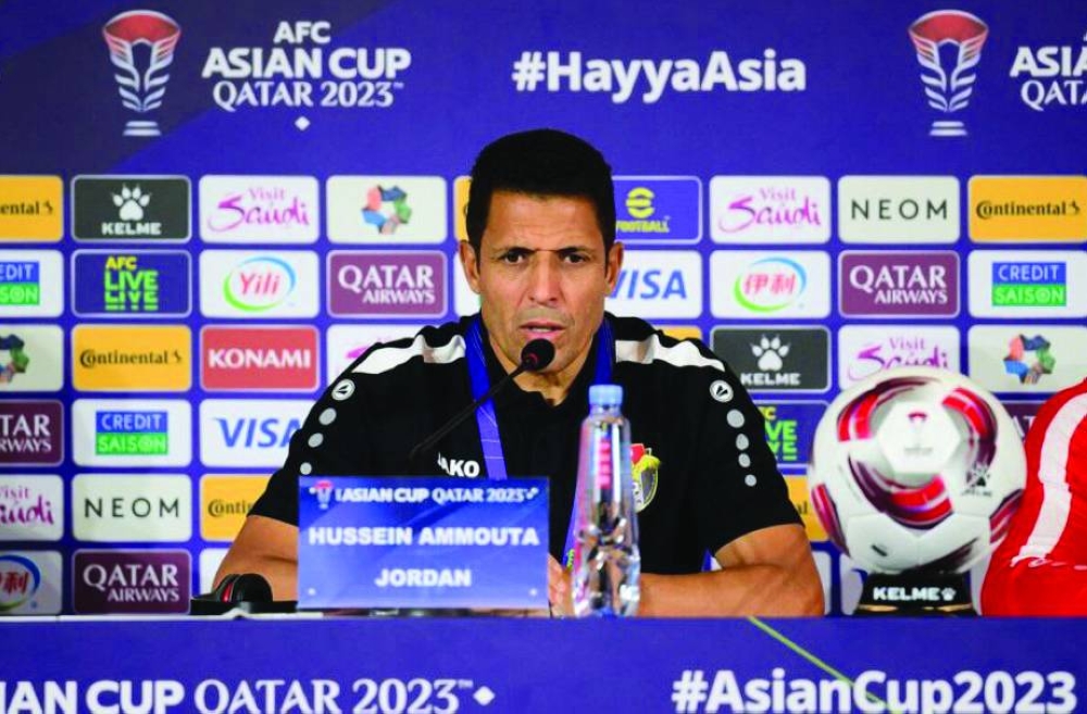
Jordan coach Hussein Ammouta attends a press conference. 