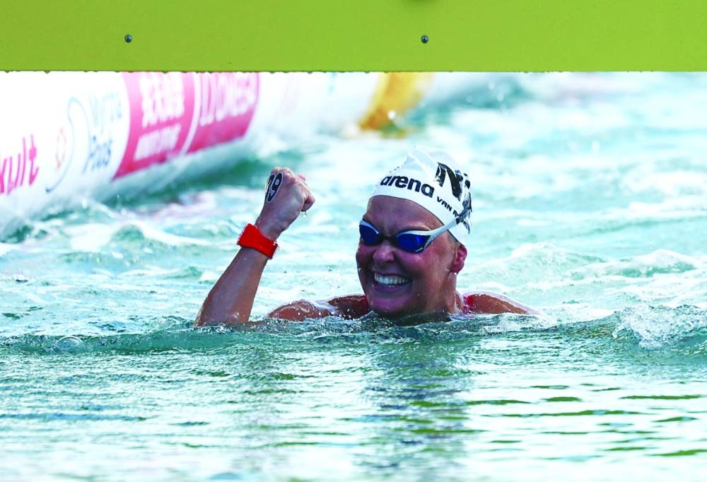 Netherlands’ Sharon Van Rouwendaal celebrates after winning the women’s 10km open water title at the World Aquatics Championships at Old Doha Port on Saturday. (Reuters)
