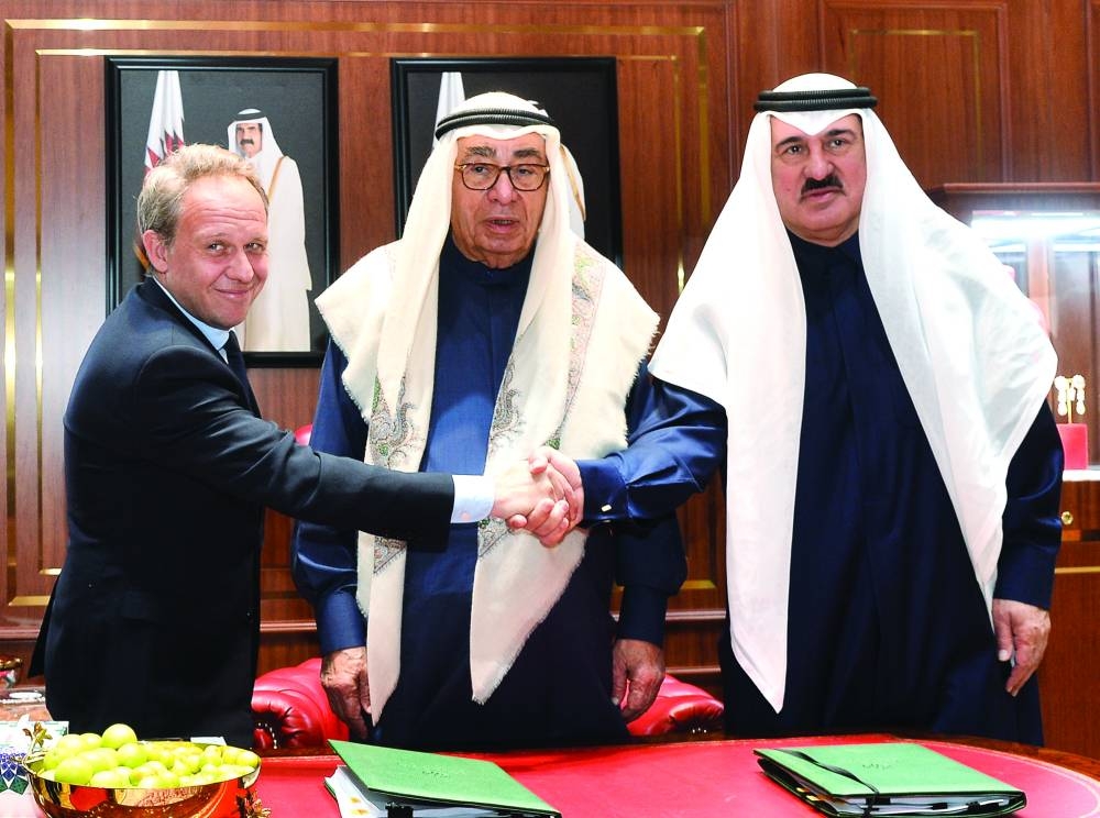 (From left) Kolia Neveux, Hussain Ibrahim Alfardan, and Ali Alfardan at the signing ceremony, held at the Alfardan pavilion. PICTURES: Shaji Kayamkulam