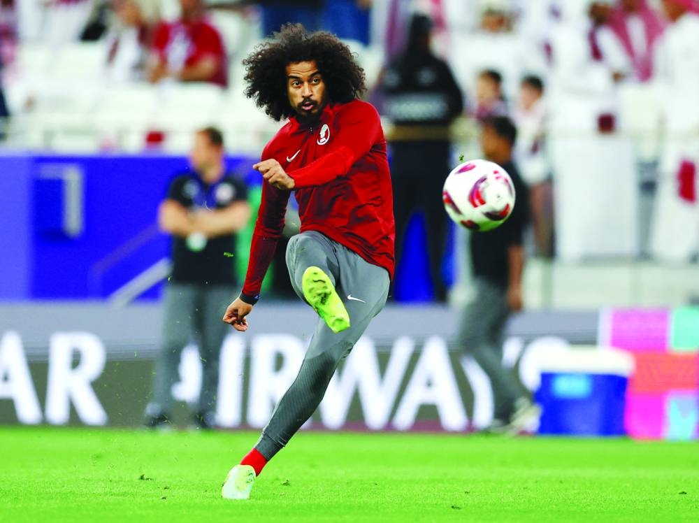 Qatar’s Akram Afif during the warm up before the semi-final match against Iran.  (Reuters)