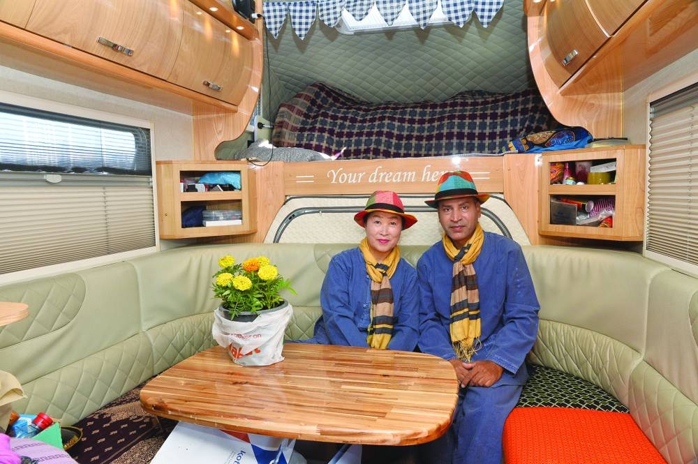 Korean couple Mohamed Aamir and Fatima Zahra inside their touring van. PICTURE: Shaji Kayamkulam