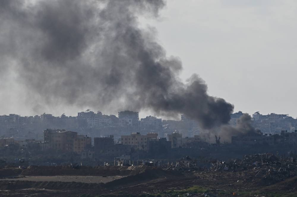 Smoke rises from Gaza, as seen from Sderot, Israel on Friday. REUTERS