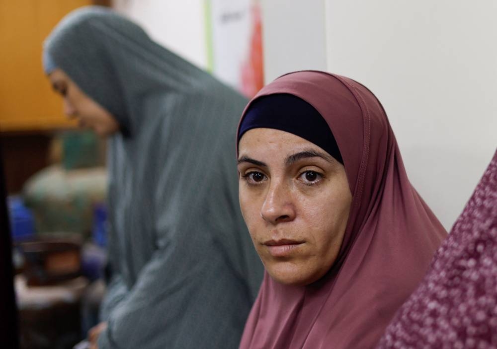 Palestinian women who were detained by Israel in Rafah on Friday. REUTERS