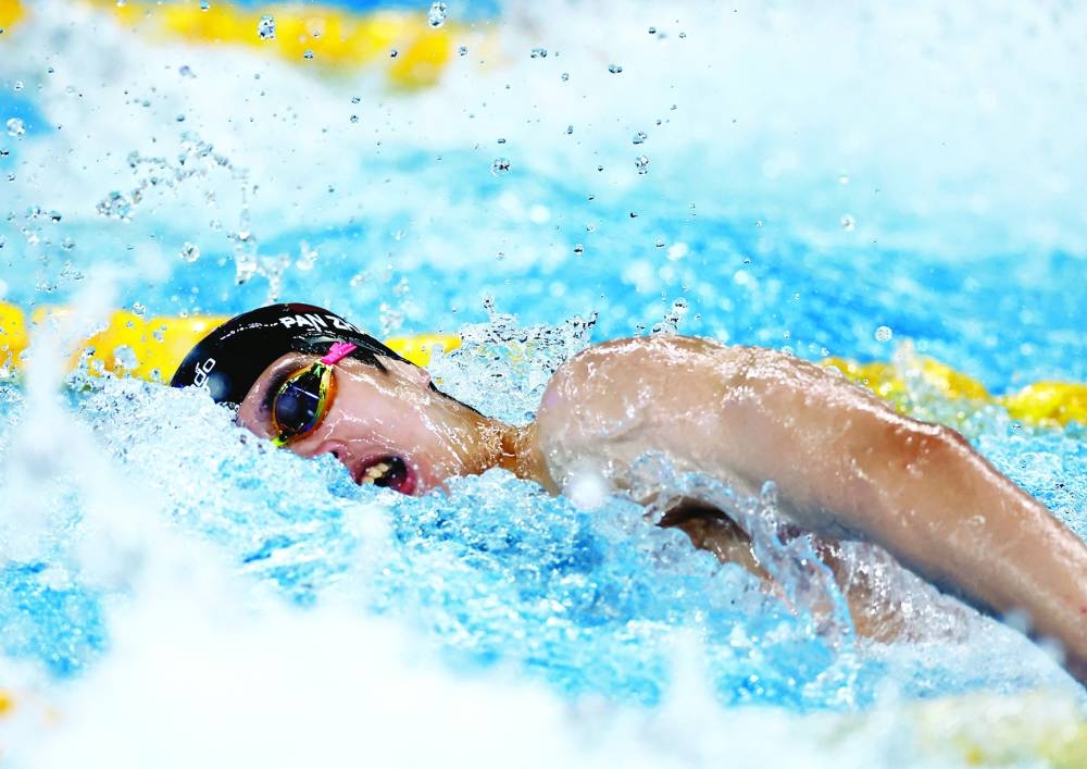 
Chinese swimmer Pan Zhanle, aged 19, in action during the men’s 4x100m freestyle relay during the World Aquatics Championships at Aspire Dome in Doha yesterday. (Reuters) 