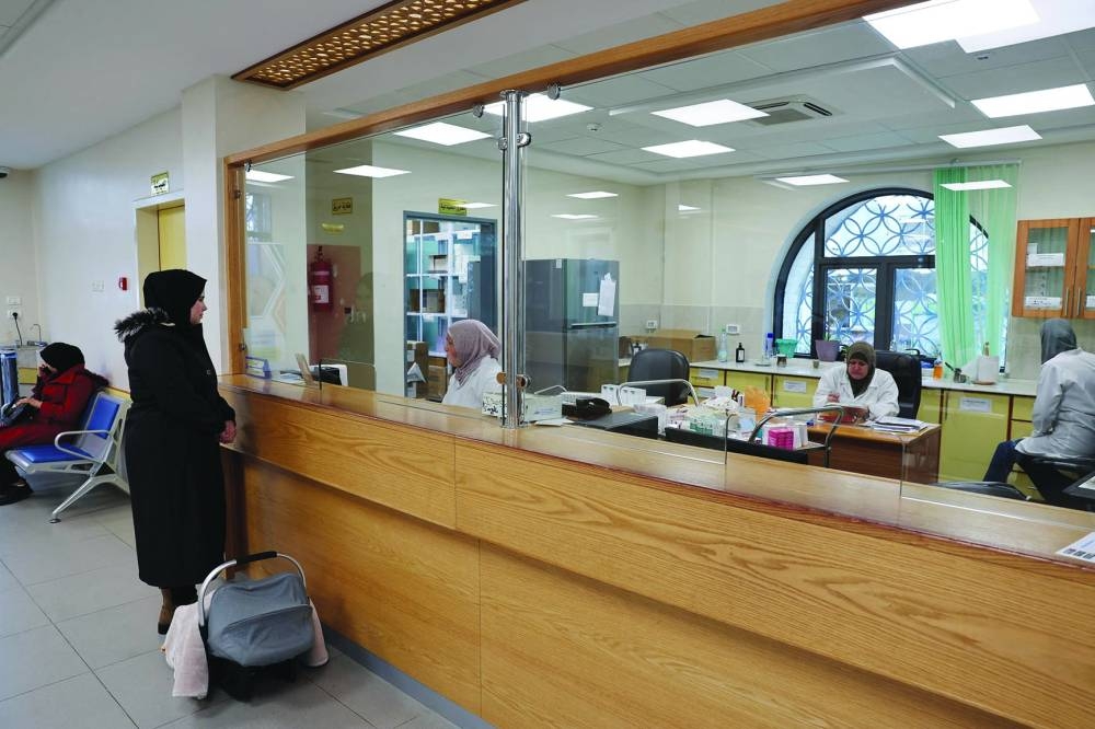 
A Palestinian gets medicine in a UNRWA health centre in the Aida refugee camp in Bethlehem in the occupied West Bank. 