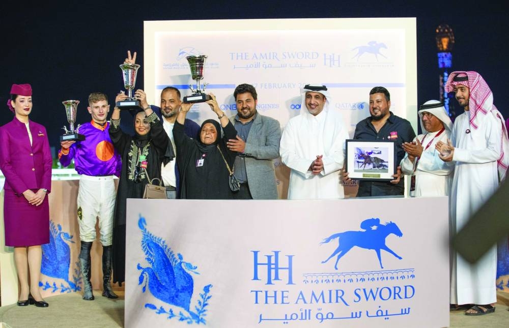 
Saif al-Nuami, Operations Manager at Al Shaqab, poses with the connections of Dhergham Bu Thaila, which won the Local Thoroughbred Sand Championship. 