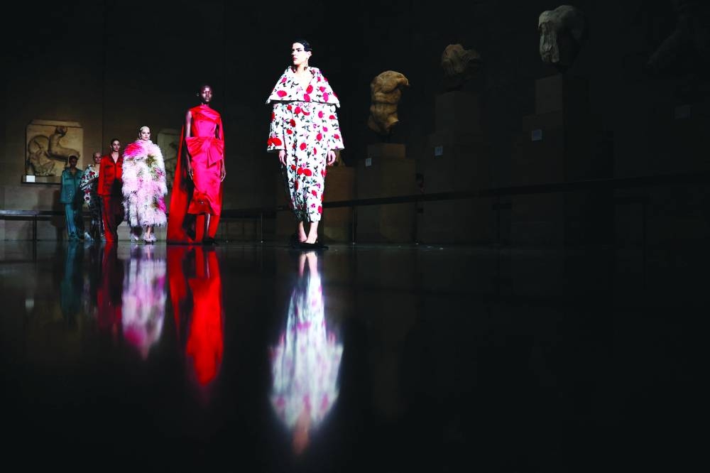 Models present creations for Erdem during their Autumn/Winter 2024 collection fashion show during London Fashion Week in London on Saturday.