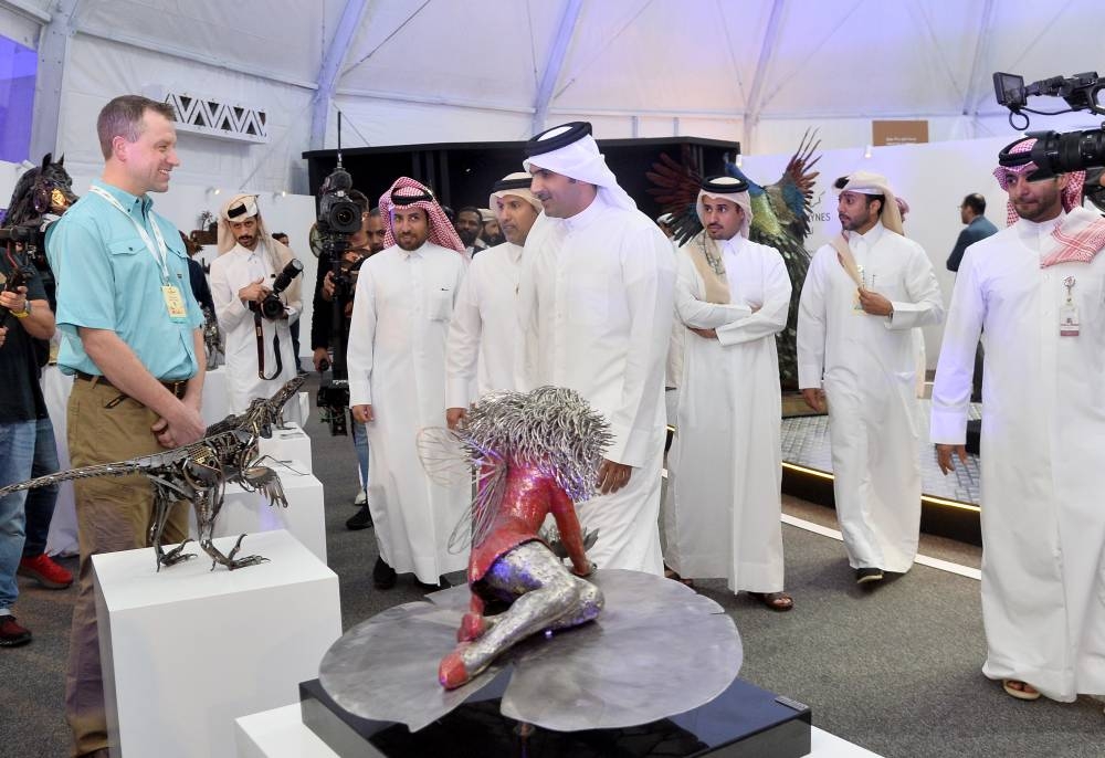 HE the Minister of Culture Sheikh Abdulrahman bin Hamad al-Thani touring the Tadweer (Recycling) Arts Exhibition at Souq Waqif's western zone Sunday. PICTURE: Shaji Kayamkulam