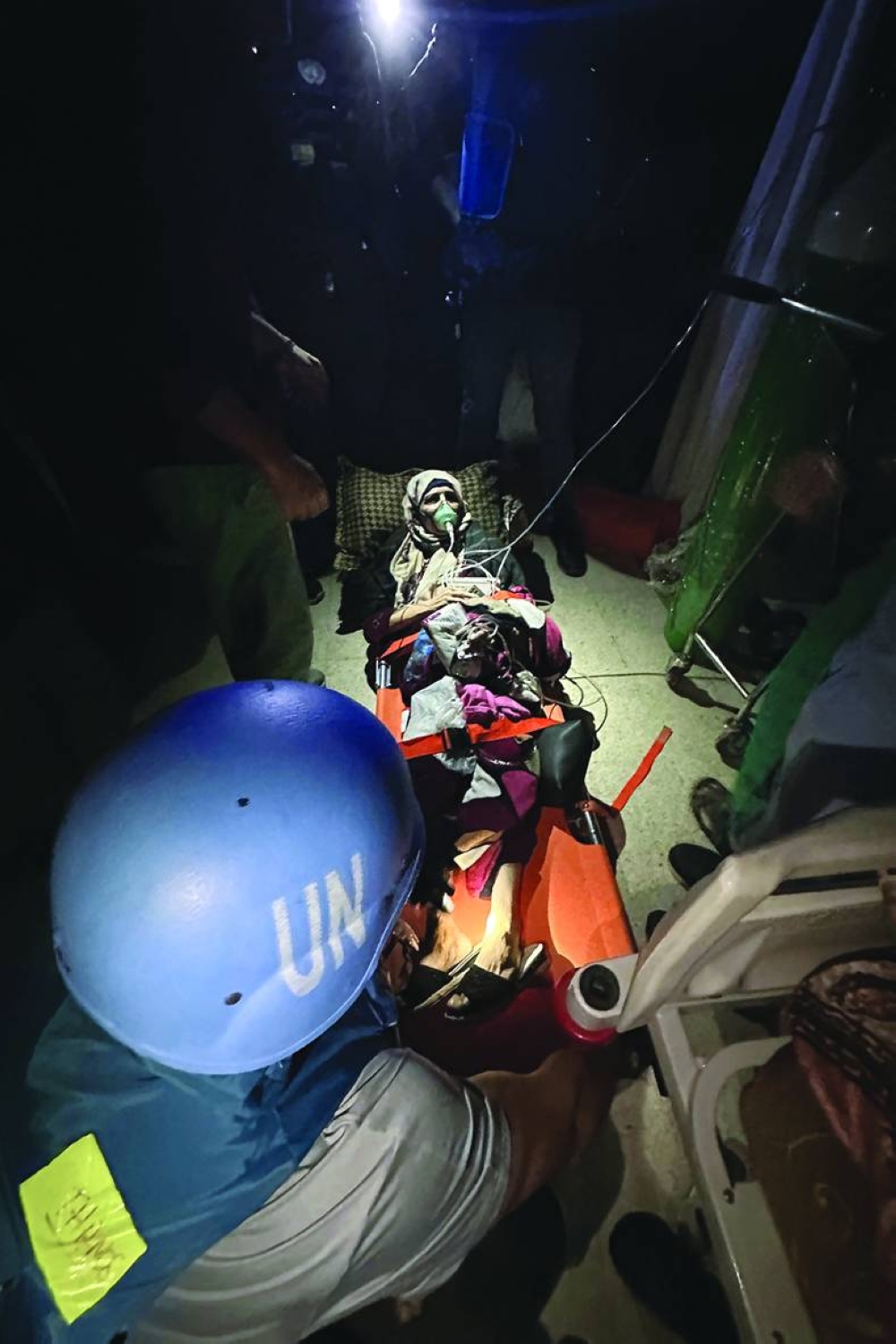 A patient being evacuated  from Nasser hospital in Khan Younis  during a mission by WHO, UN humanitarian agency OCHA and the Palestinian Red Crescent, Tuesday.