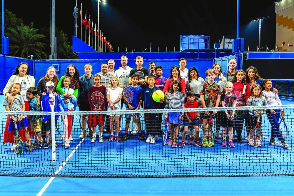 
Children from the ExxonMobil Qatar community were invited to take part in a kids clinic with players during the tournament. 