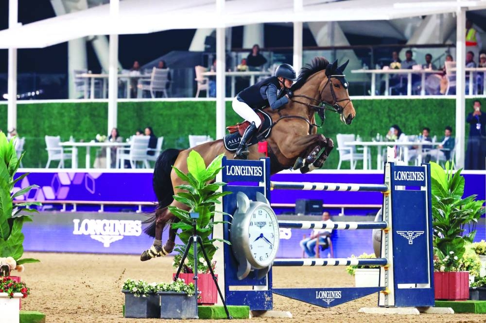 Swedish rider Malin Baryard-Johnsson and her mare H&M Indiana clear a hurdle during the CHI Al Shaqab Grand Prix CSI5* 1.60m on Saturday.