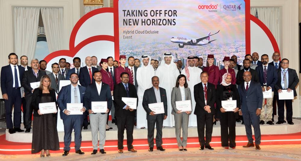 Ooredoo Qatar CEO Sheikh Ali bin Jabor bin Mohammad al-Thani with Qatar Airways Group Chief Executive Officer Badr Mohammed al-Meer with the team behind the 'Hybrid Multi-Cloud' environment. PICTURE: Shaji Kayamkulam