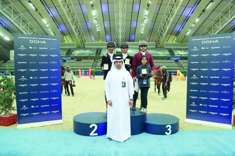 Hamza Mohamed al-Kuwari, Corporate Services Director at Al Shaqab, poses with the CSIJ 1.15m 2 Phases Special winner Tameem Ibrahim al-Hor, runner-up Suhaim Hamad al-Yafei and third-placed Sheikh Mohamed Jassim al-Thani.