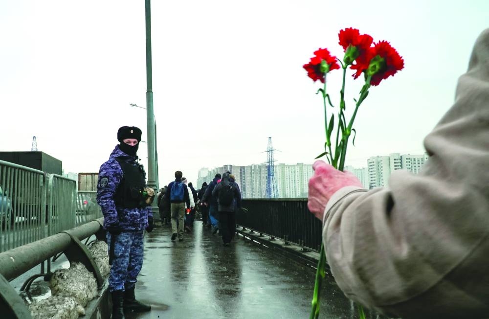 
In this video grab, mourners walk in a procession towards the 
Borisovo cemetery during the burial of Navalny, in Moscow. 
