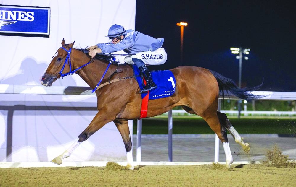 
Jockey Szczepan Mazur guides X Force to Fuwairit Cup 
victory yesterday. 
