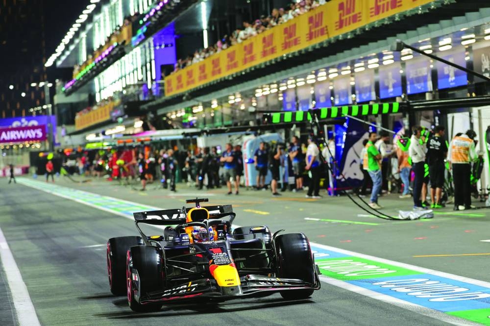Red Bull Racing’s Dutch driver Max Verstappen drives in the pit lane ahead of the qualifying session of the Saudi Arabian Grand Prix at the Jeddah Corniche Circuit on Friday. (AFP)