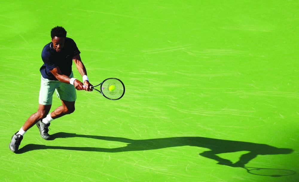 Gael Monfils of France plays a backhand against Max Purcell of Australia in their first round match during the BNP Paribas Open in Indian Wells, California. (AFP)