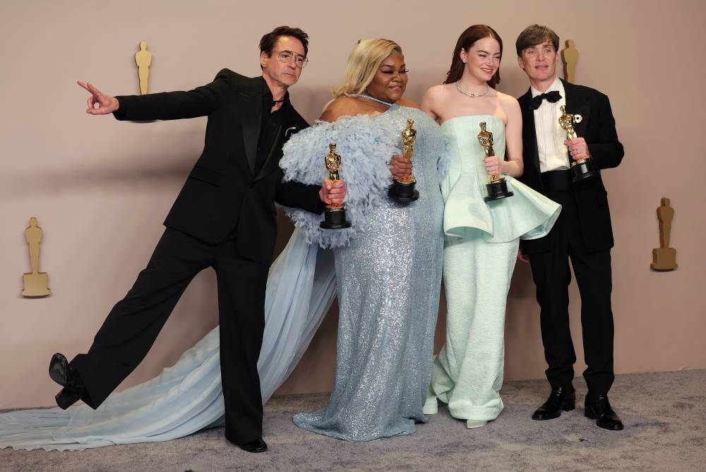 Cillian Murphy, winner of the Best Actor Oscar for "Oppenheimer", joins Emma Stone, winner of the Best Actress Oscar for "Poor Things", Da'Vine Joy Randolph, Best Supporting Actress Oscar winner for "The Holdovers", and Robert Downey Jr., Best Supporting Actor Oscar winner for "Oppenheimer", in the Oscars photo room at the 96th Academy Awards in Hollywood, Los Angeles. REUTERS