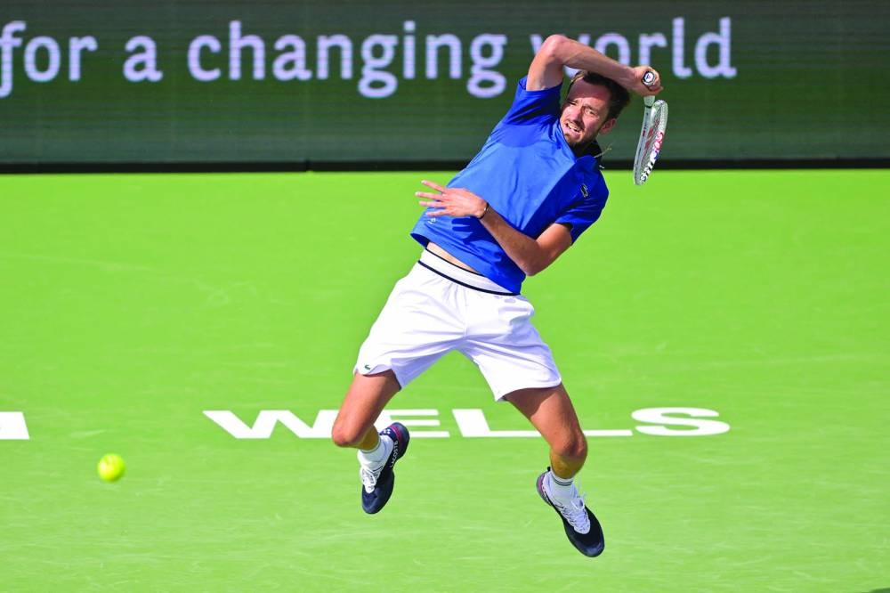 Daniil Medvedev of Russia hits a shot in his fourth-round match as he defeated Grigor Bimitrov of Bulgaria in the BNP Paribas Open at the Indian Wells Tennis Garden. (USA TODAY Sports)