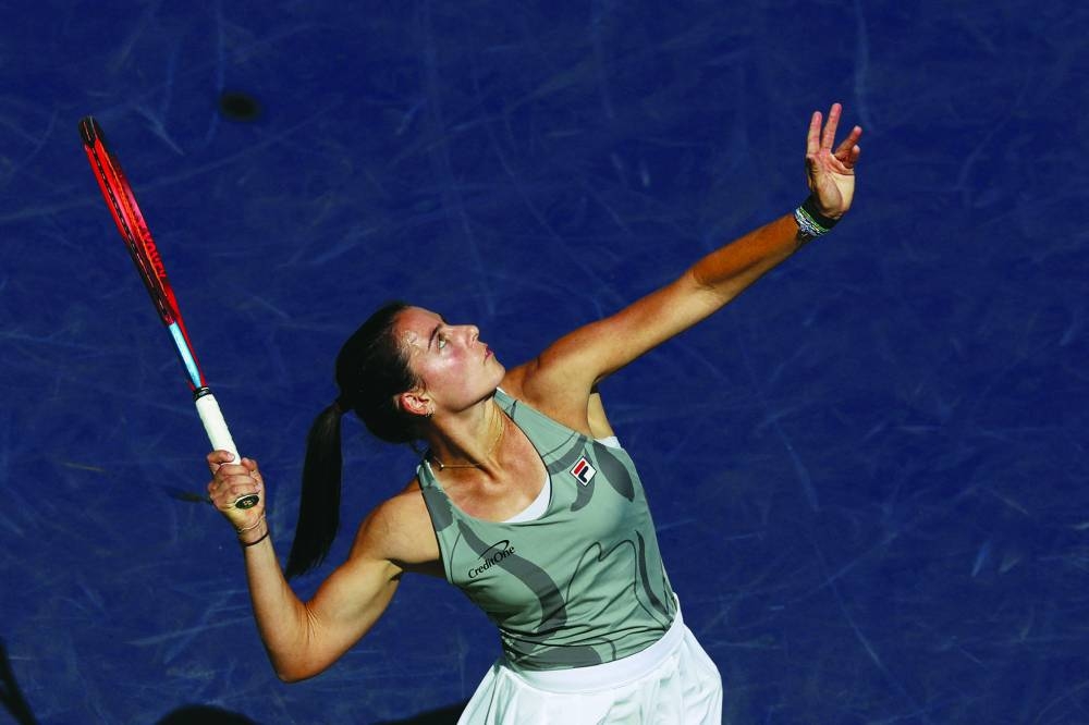 Emma Navarro of the US serves against Aryna Sabalenka in their fourth-round match during the BNP Paribas Open. (AFP)
