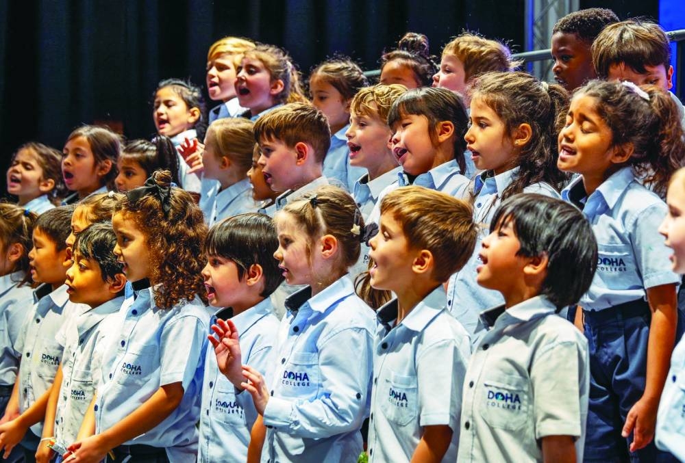 Young children enjoying their QSCoY performance.