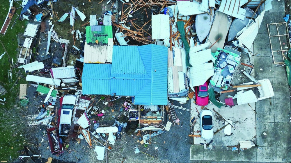 
Damage from tornadoes is revealed in the morning light after tornadoes ripped through the Indian Lake area of Logan County, Ohio. 