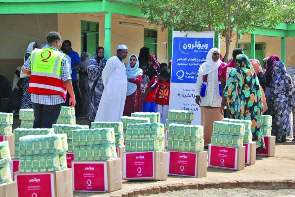 Qatar Charity's teams began distributing food baskets in 11 shelter centres.
