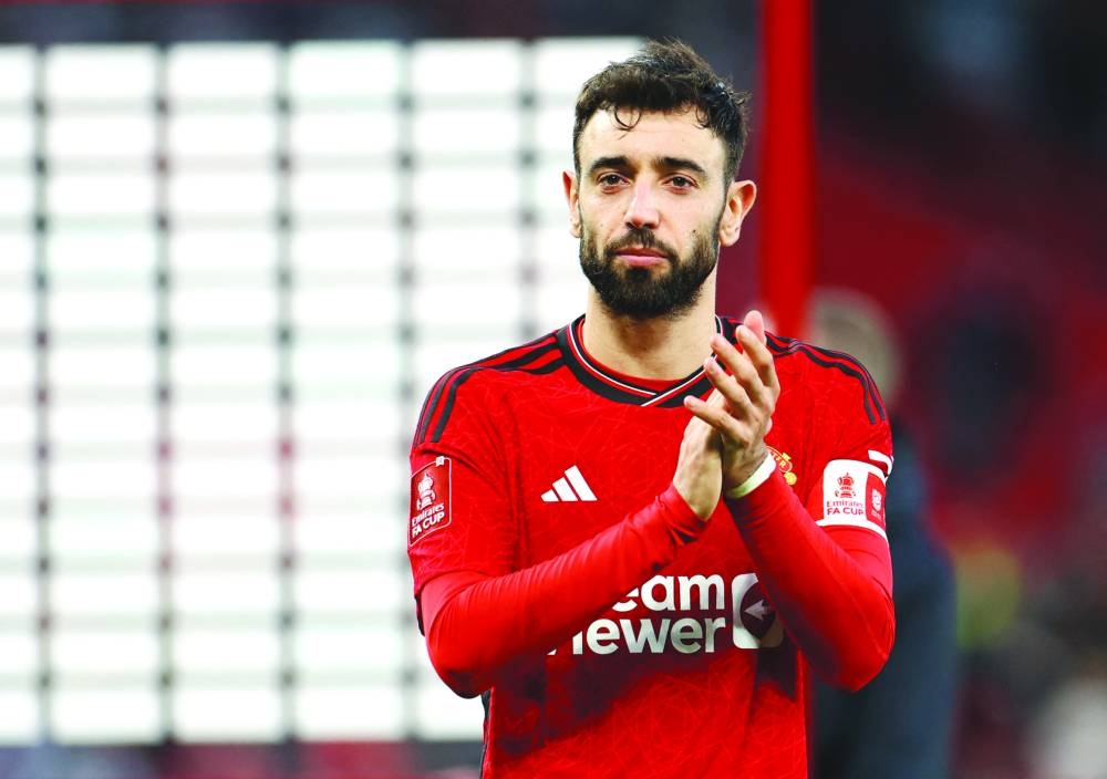 Soccer Football - FA Cup - Quarter Final - Manchester United v Liverpool - Old Trafford, Manchester, Britain - March 17, 2024 Manchester United's Bruno Fernandes celebrates after the match REUTERS/Molly Darlington