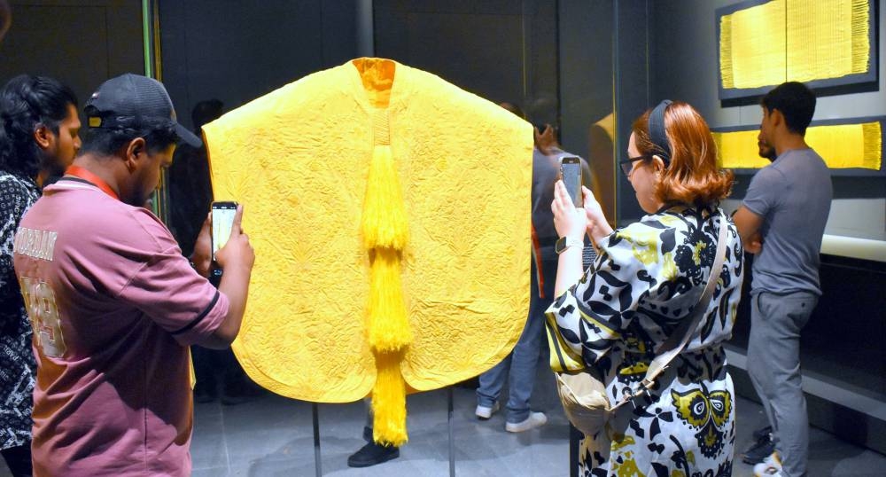 A woven spider silk cape, produced from 1.2 million spiders, was completed in two years. PICTURE: Thajudheen