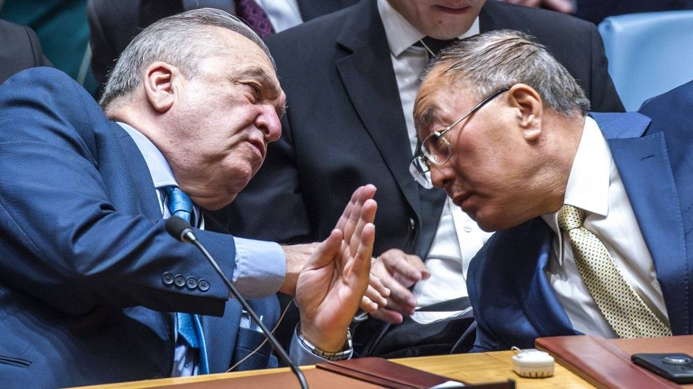 Permanent Representative of Algeria to the United Nations Amar Bendjama (L) talks to China's ambassador to the United Nations, Zhang Jun, after voting against a US ceasefire resolution for the Gaza war. AFP