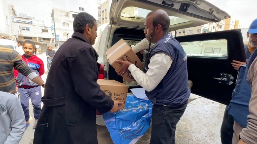 World Health Organization (WHO) workers unload supplies from a convoy at Kamal Adwan Hospital in Gaza. WHO/Handout via REUTERS 