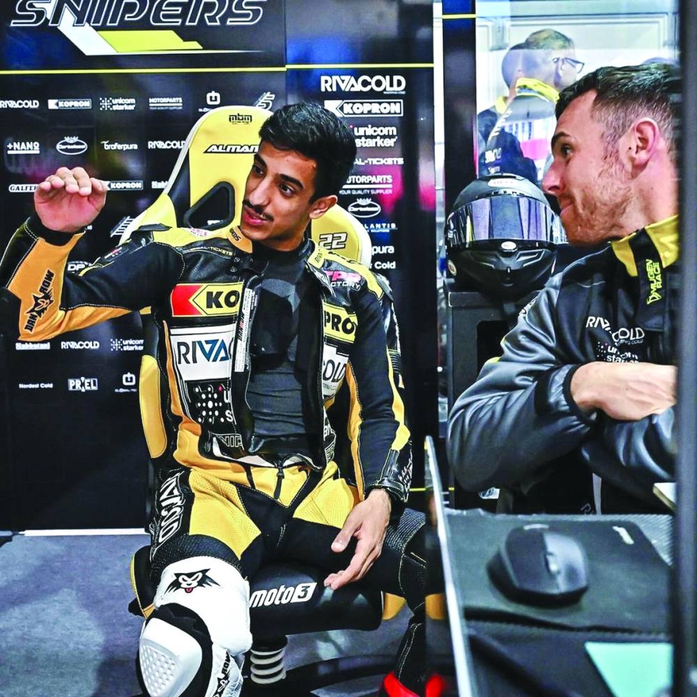 Qatar’s Hamad al-Sahouti (left) made his Moto3 World Championship debut with the Rivacold Snipers Team.
