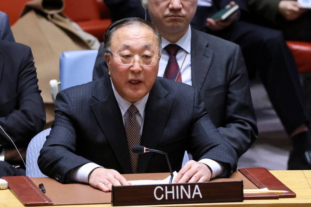 China's Representative to the United Nations Zhang Jun addresses the Security Council on the day of a vote on a Gaza resolution that demands an immediate ceasefire for the month of Ramadan leading to a permanent sustainable ceasefire, and the immediate and unconditional release of all hostages, at UN headquarters in New York City, on Monday. REUTERS
