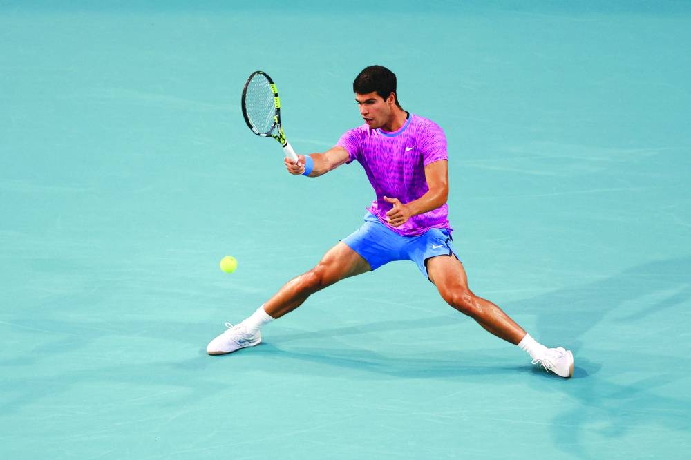 
Carlos Alcaraz of Spain returns a shot against Gael Monfils of France in their Miami Open match at Hard Rock Stadium in Miami Gardens. (AFP) 