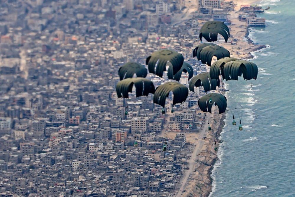 Humanitarian aid being airdropped over Gaza from a  Royal Air Force A400M aircraft. AFP/ CROWN COPYRIGHT 2024 / MOD / AS1 LEAH JONES / RAF