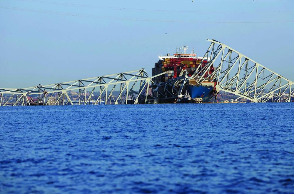 
Wreckage from the Francis Scott Key Bridge rests on the Dali cargo ship in Baltimore. 