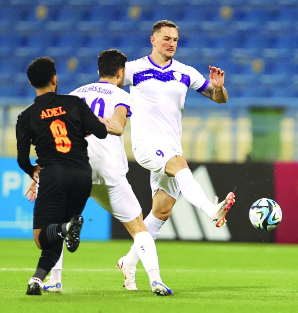 Muaither’s Tiago Leonco (right) scores against Umm Salal in the Expo Stars League at the Thani Bin Jassim Stadium on Friday.