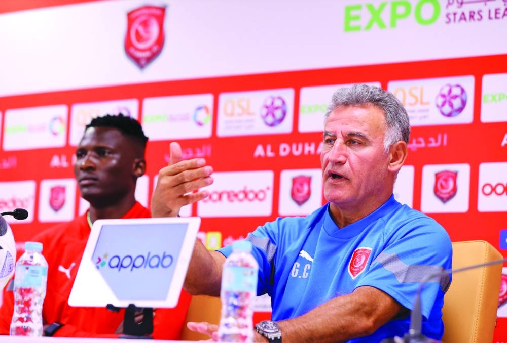 Al Duhail coach Christophe Galtier (right) and striker Michael Olunga address a press conference on Thursday.