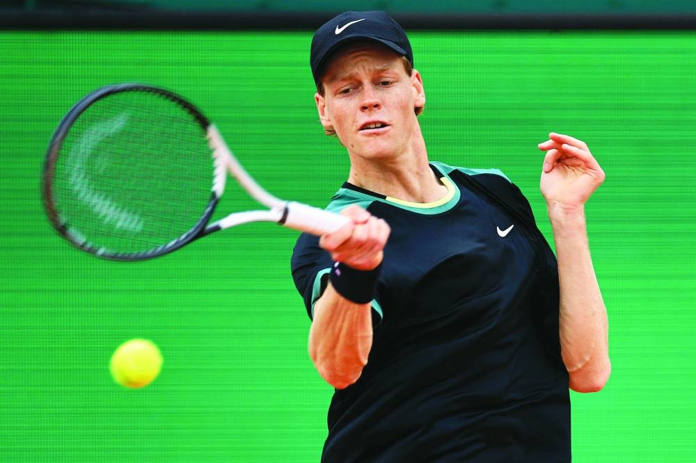 Jannik Sinner plays a forehand return to Sebastian Korda on Wednesday. (AFP)